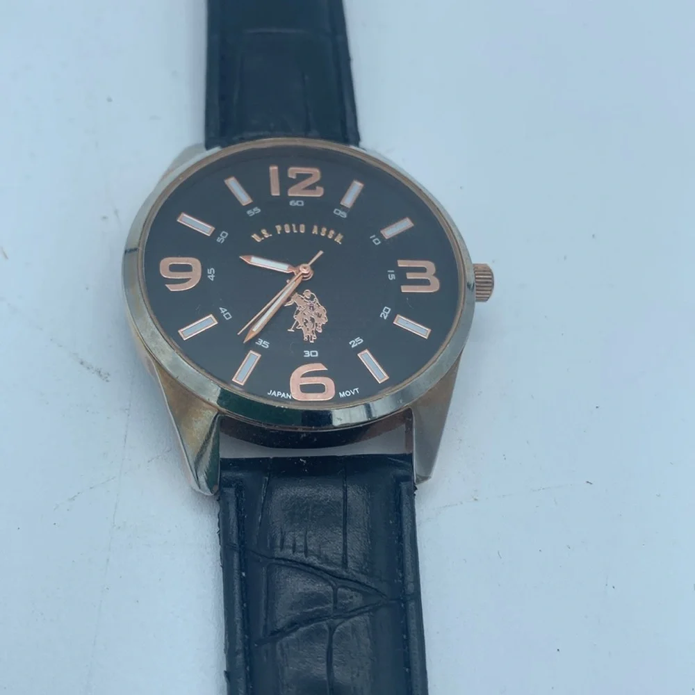 US Polo Assn rose gold tone wristwatch faux leather black band needs battery